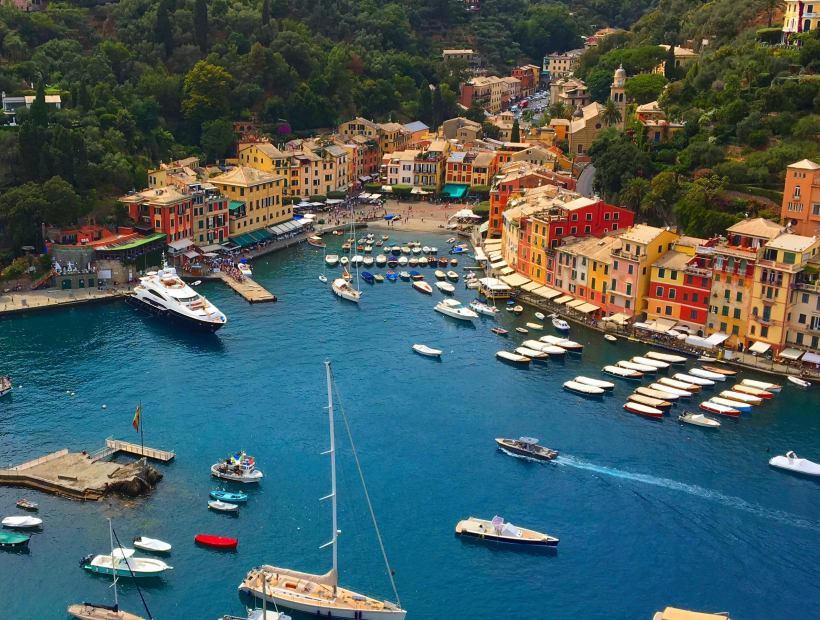 Portofino harbor with colorful buildings and boats Liguria Italy Trails