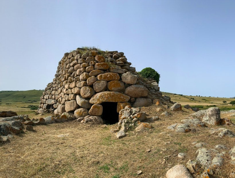 Su Nuraxi ancient nuraghe stone tower UNESCO site Sardinia Italy Trails